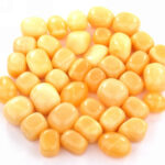 Orangencalcit Trommelsteine handpoliert Ø ca. 20 – 35 mm Edelsteine Heilsteine bei Wunderstein24