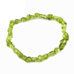 Olivin | Peridot Ø 6 x 8 mm Nugget Edelstein Armband flexibel und dehnbar Edelsteine Heilsteine bei Wunderstein24
